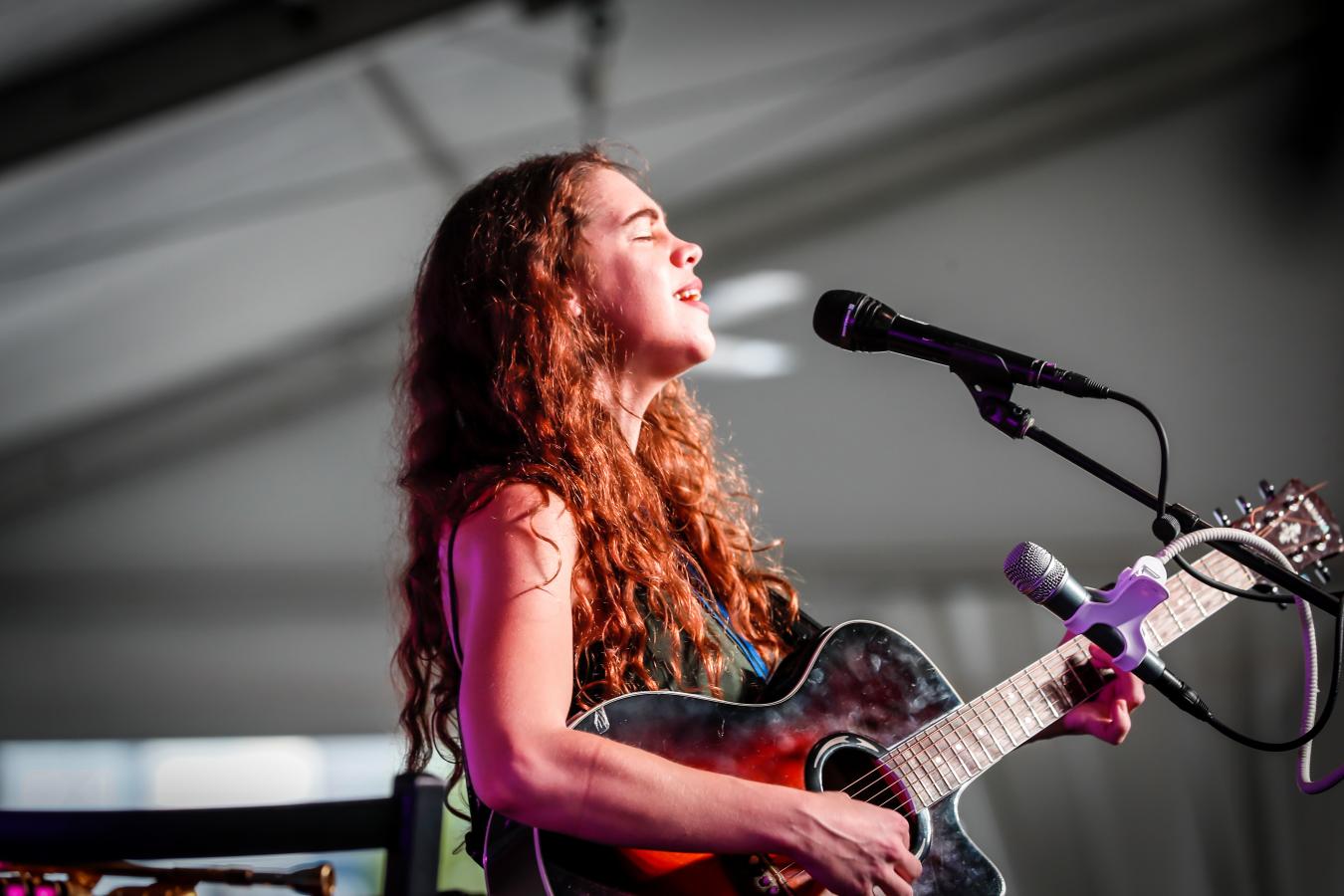 Milwaukee Irish Fest girl singing with guitar