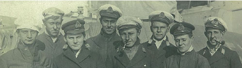 Rickard Donovan pictured on the far right smoking his pipe, with his colleagues on a submarine