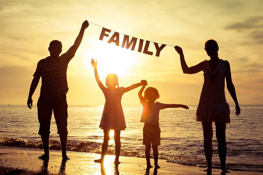 Family enjoying beach trip