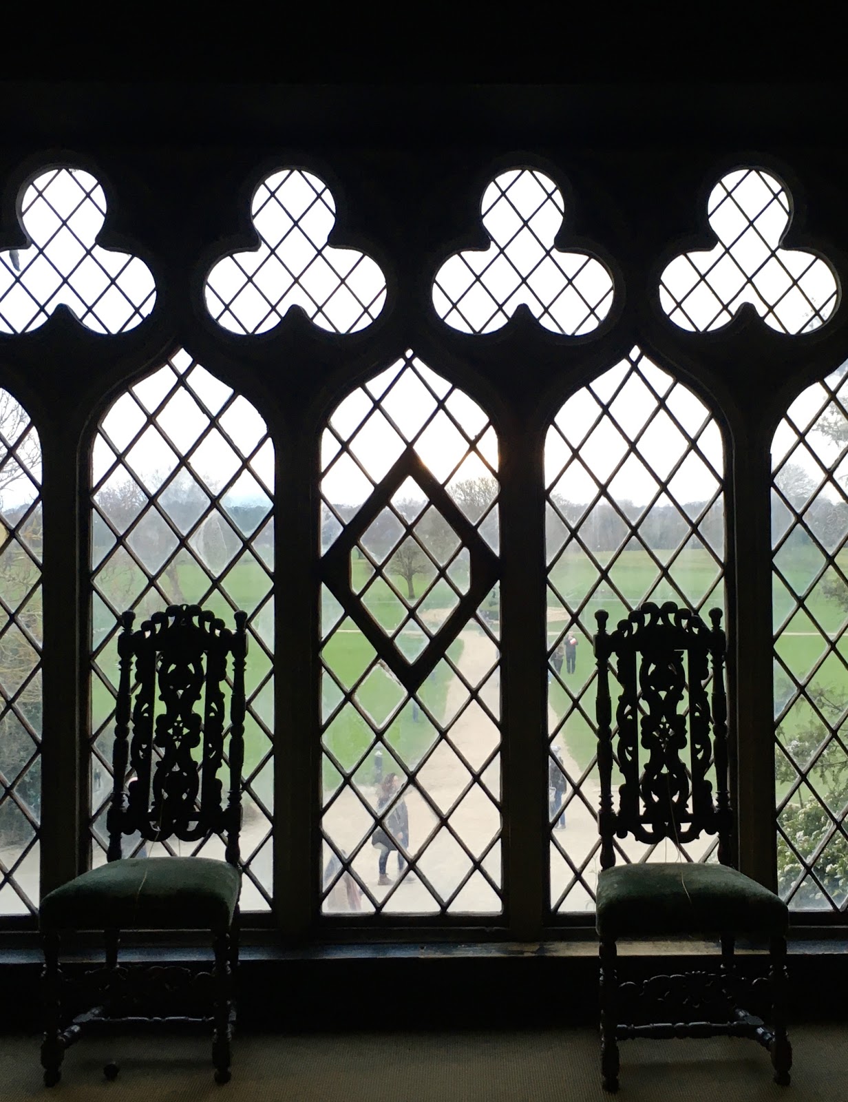 dark wood panelling and a striking front window